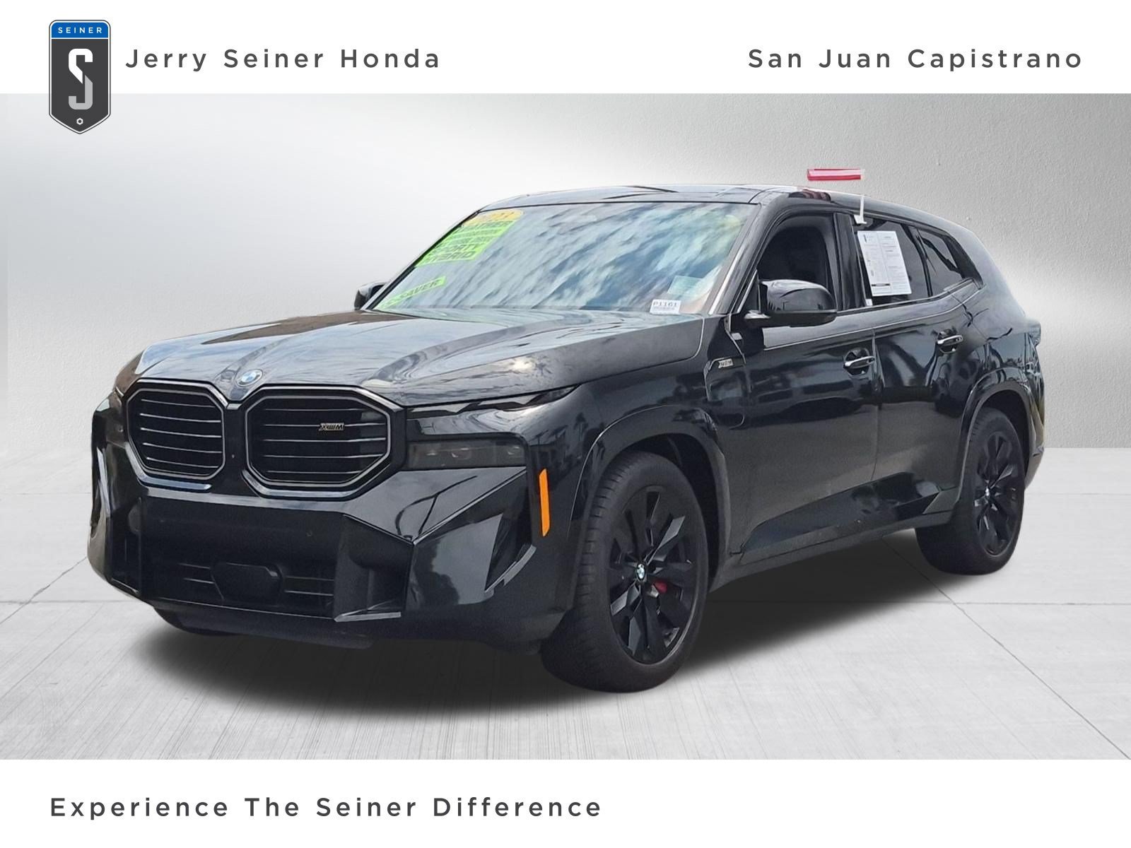 Used 2023 Black Sapphire Metallic BMW Electric/Hybrid image 1