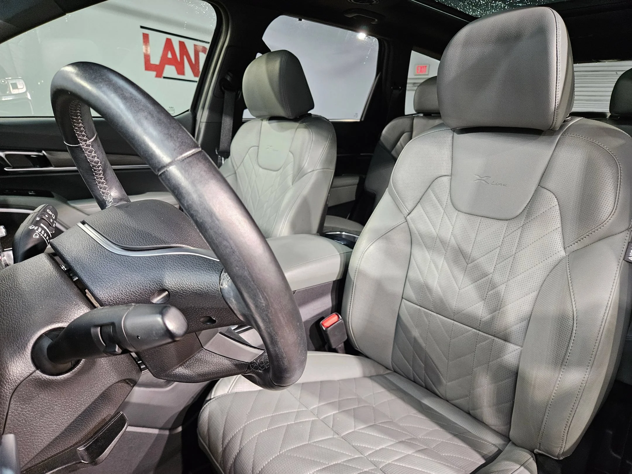 Used 2023 Ebony Black Kia SX X-Line image 25