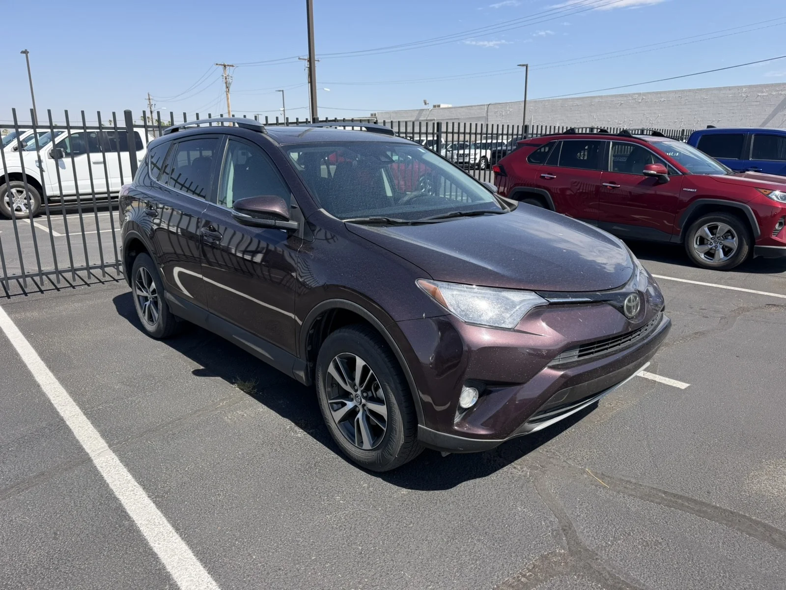 Used 2018 Black Currant Metallic Toyota XLE image 1