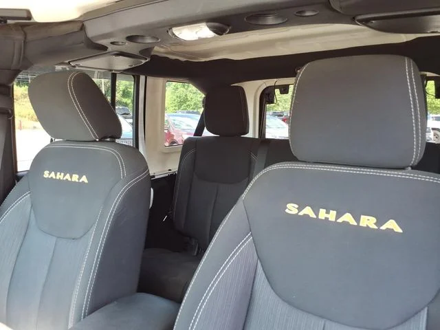 Used 2015 White Jeep Unlimited Sahara image 26