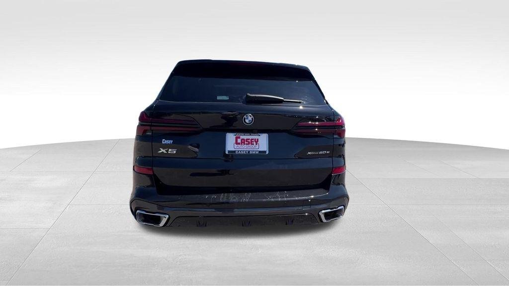 New 2026 Black Sapphire Metallic BMW xDrive50e image 11