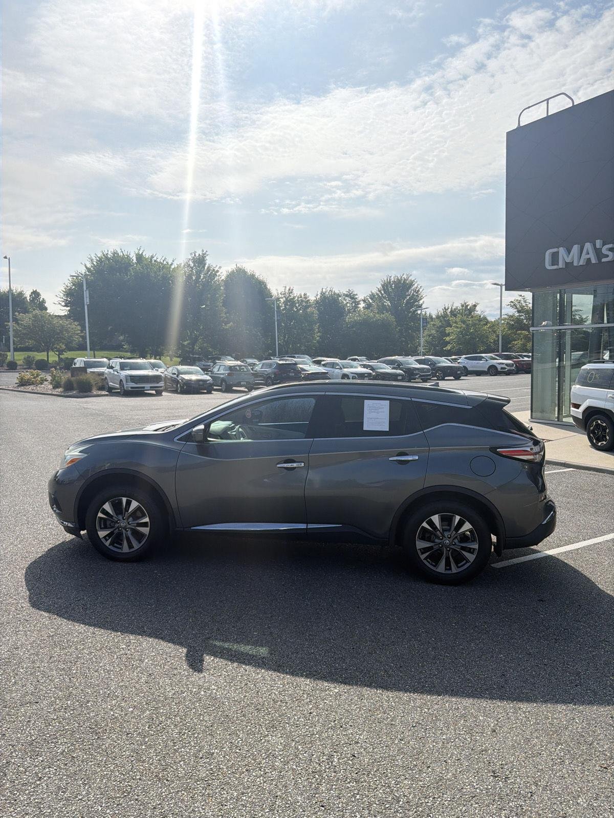 Used 2016 Gun Metallic Nissan SV image 12