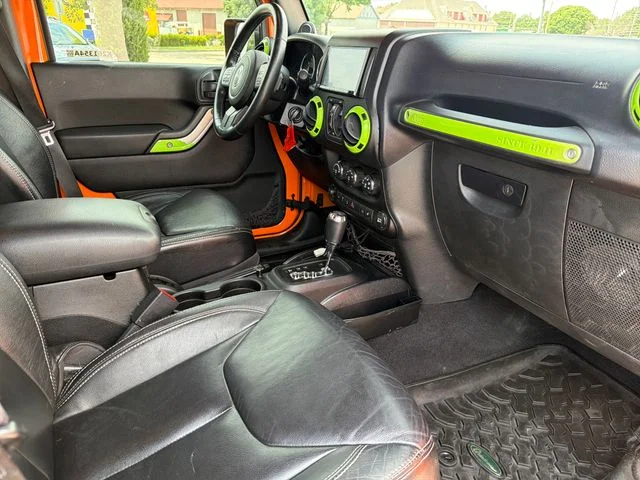 Used 2013 Orange Jeep Unlimited Rubicon image 22