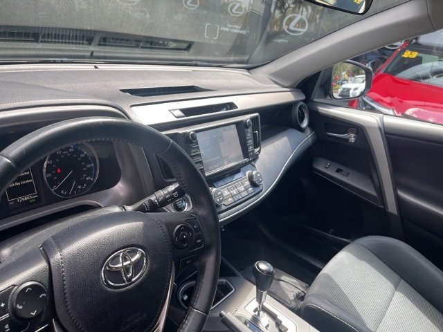Used 2016 Toyota RAV4 XLE with VIN 2T3WFREV2GW282522 for sale in North Miami, FL