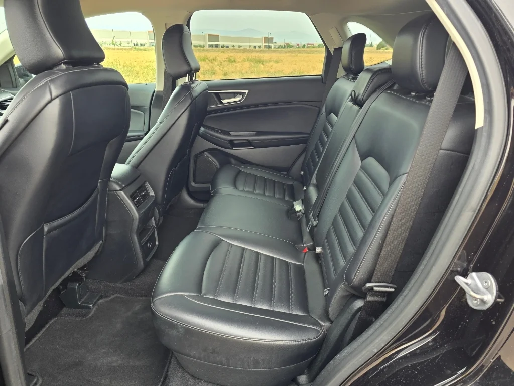 Used 2022 Agate Black Metallic Ford SEL image 14
