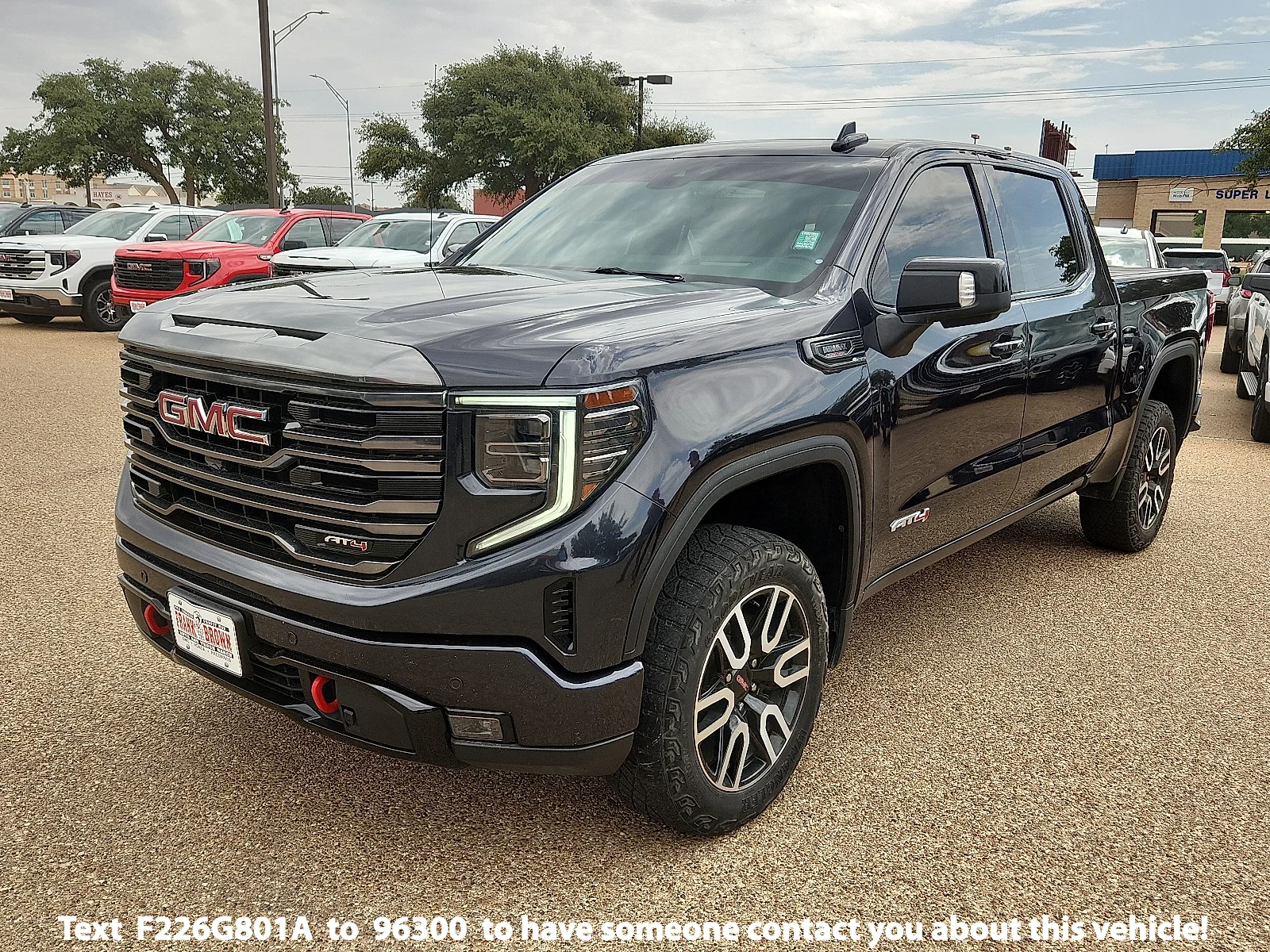 Used 2023 Silver GMC AT4 image 1