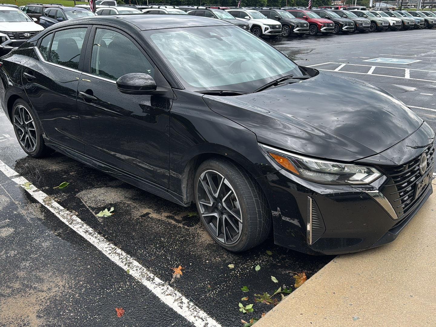 Used 2025 Super Black Nissan SR image 1