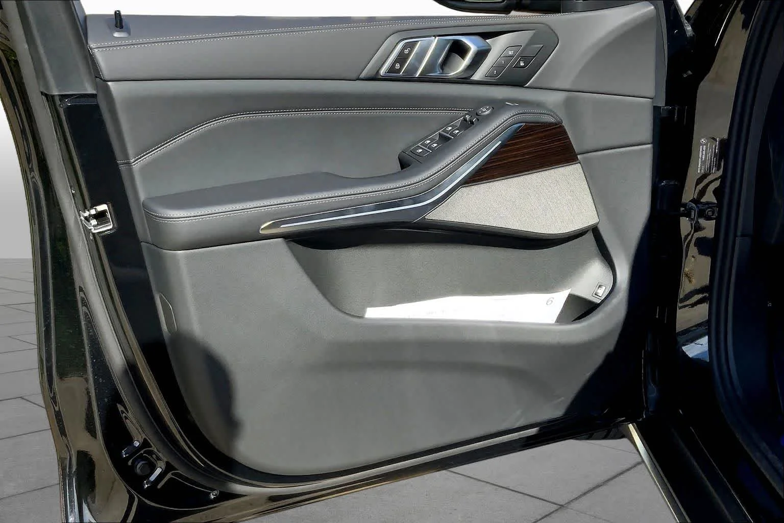 New 2026 Black Sapphire Metallic BMW xDrive50e image 10