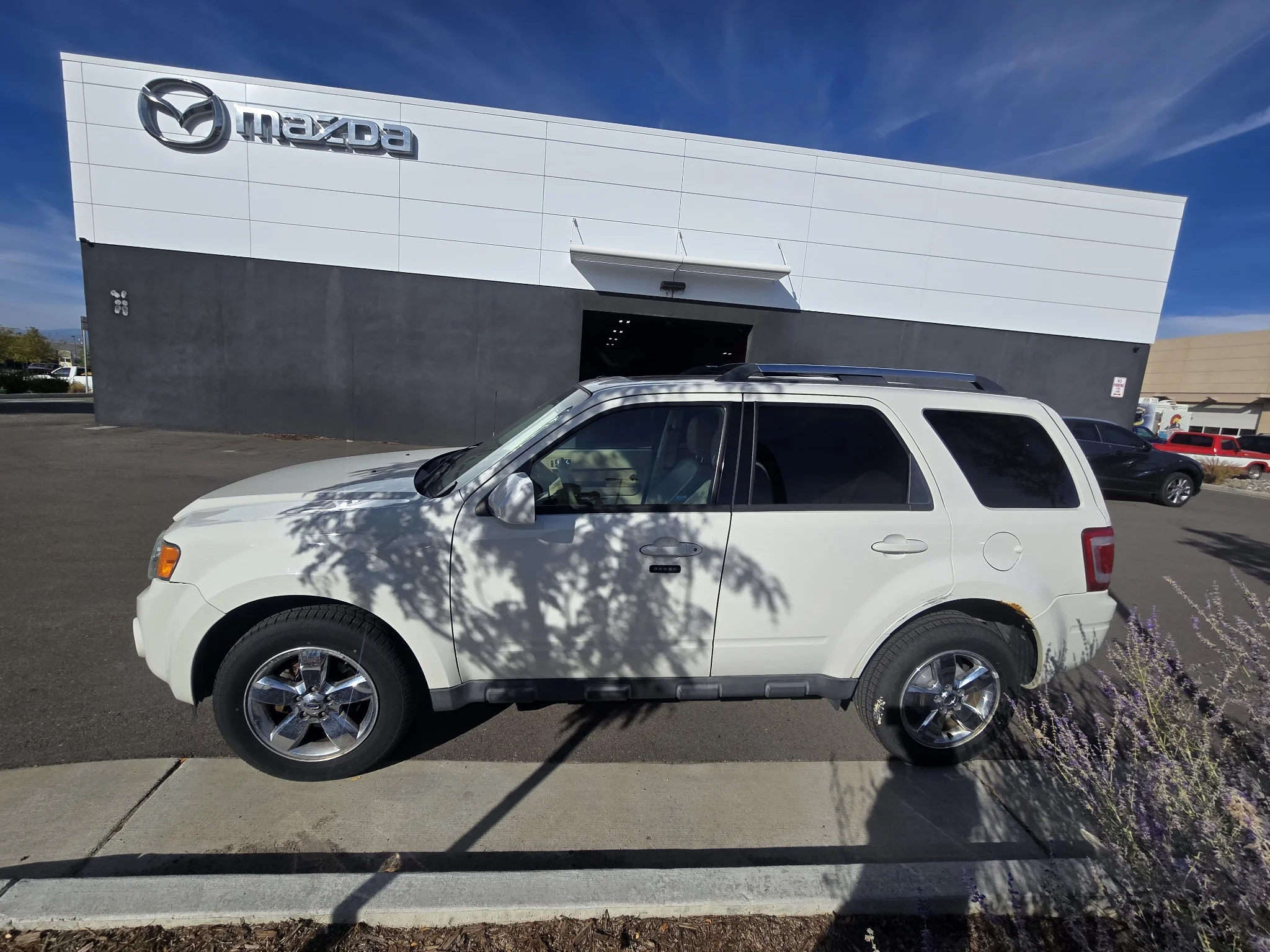 Used 2012 White Suede Ford Limited image 13
