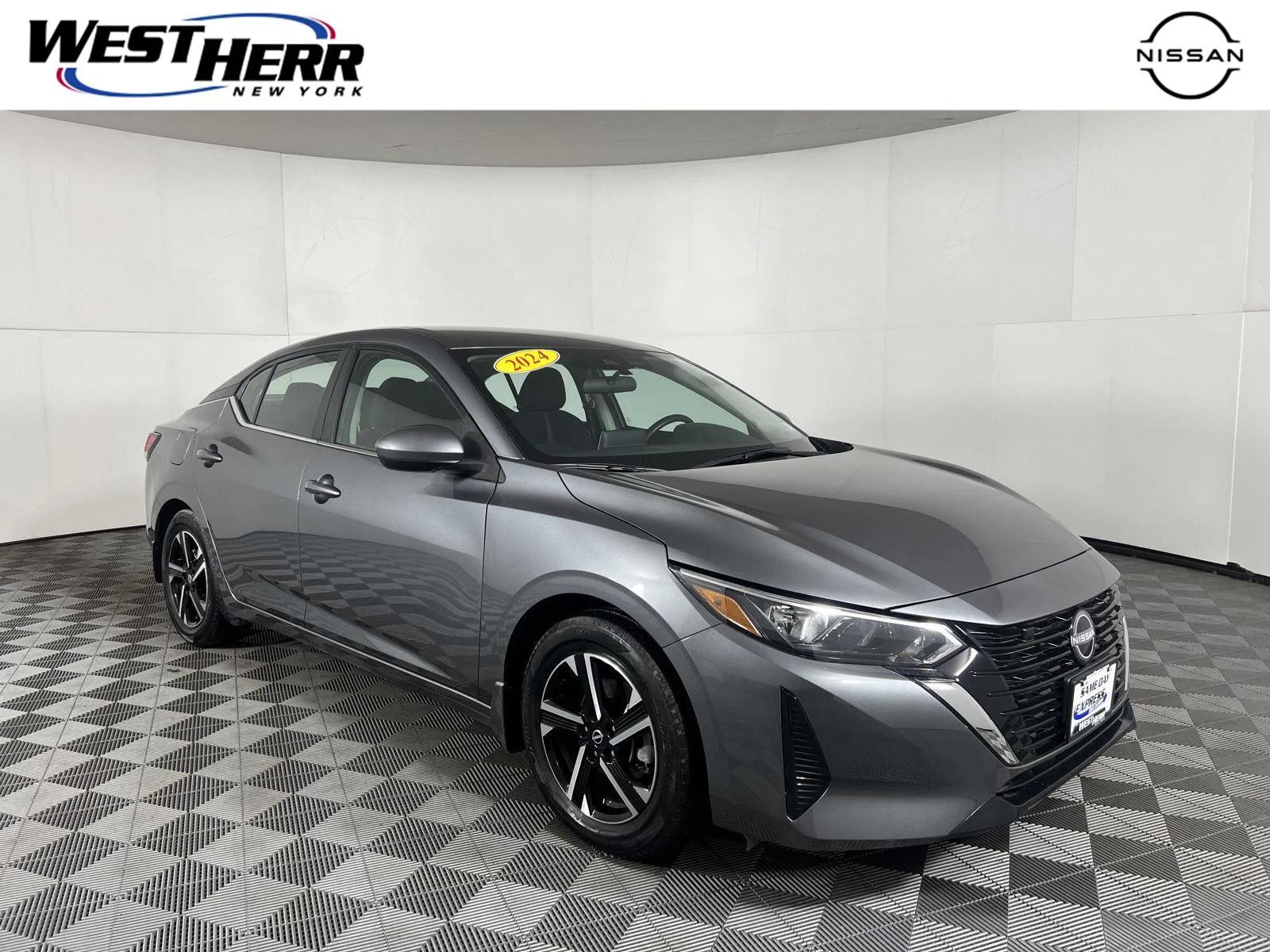 Used 2024 Gun Metallic Nissan SV image 1