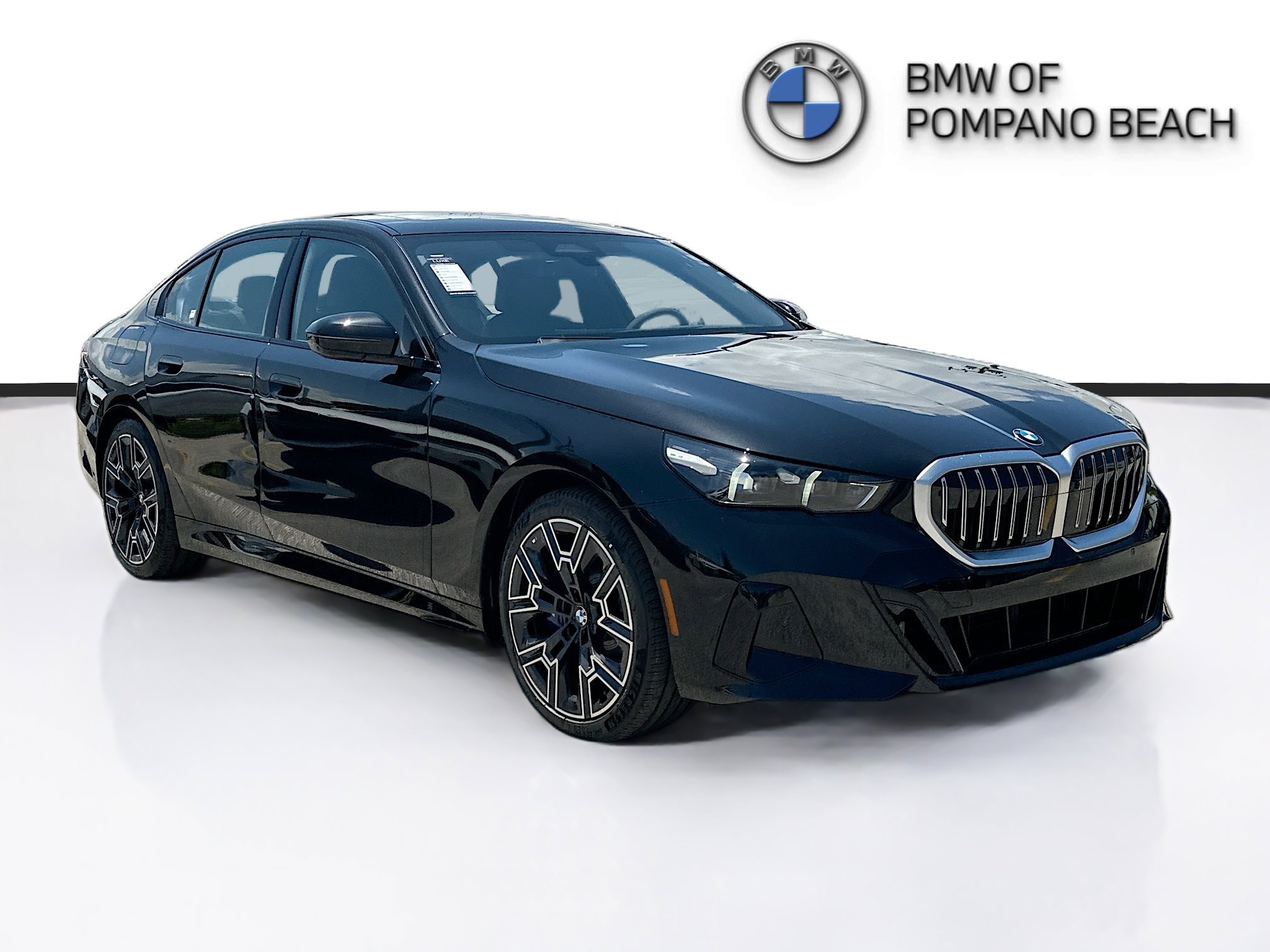 New 2027 Black Sapphire Metallic BMW 530i image 1