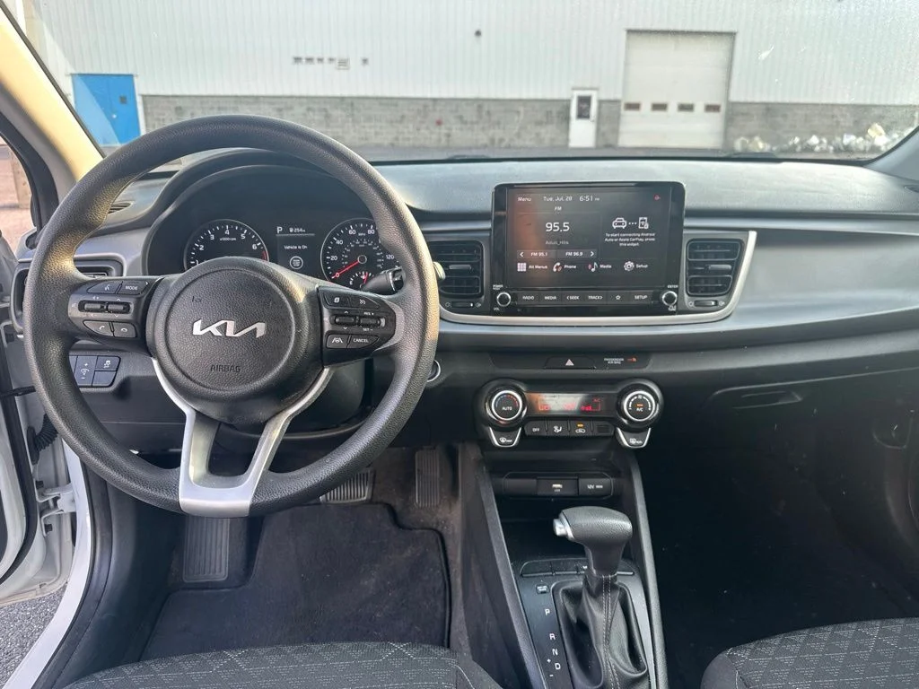 Used 2023 Clear White Kia S image 17
