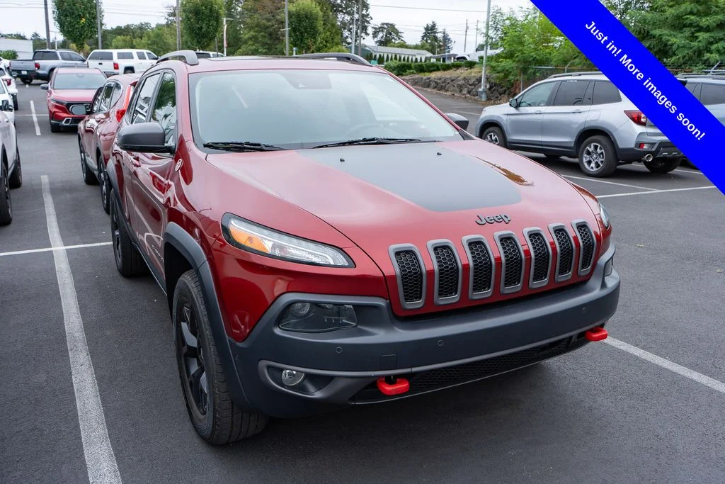 Used 2017 Deep Cherry Red Crystal Jeep Trailhawk L Plus image 1