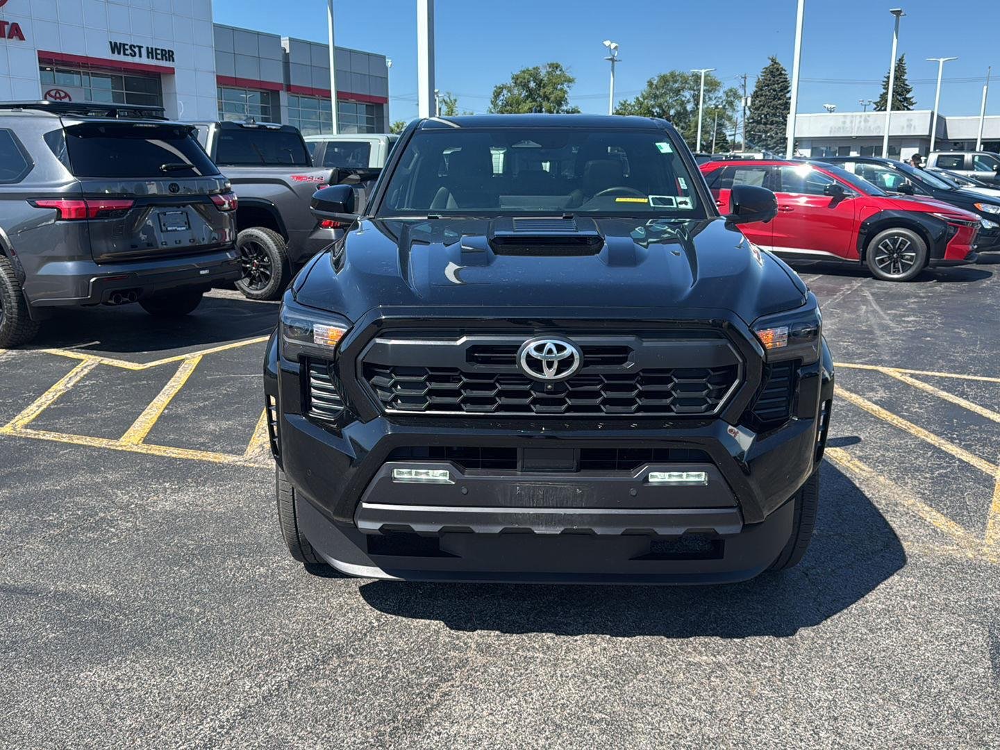 Used 2024 Black Toyota TRD Sport image 2