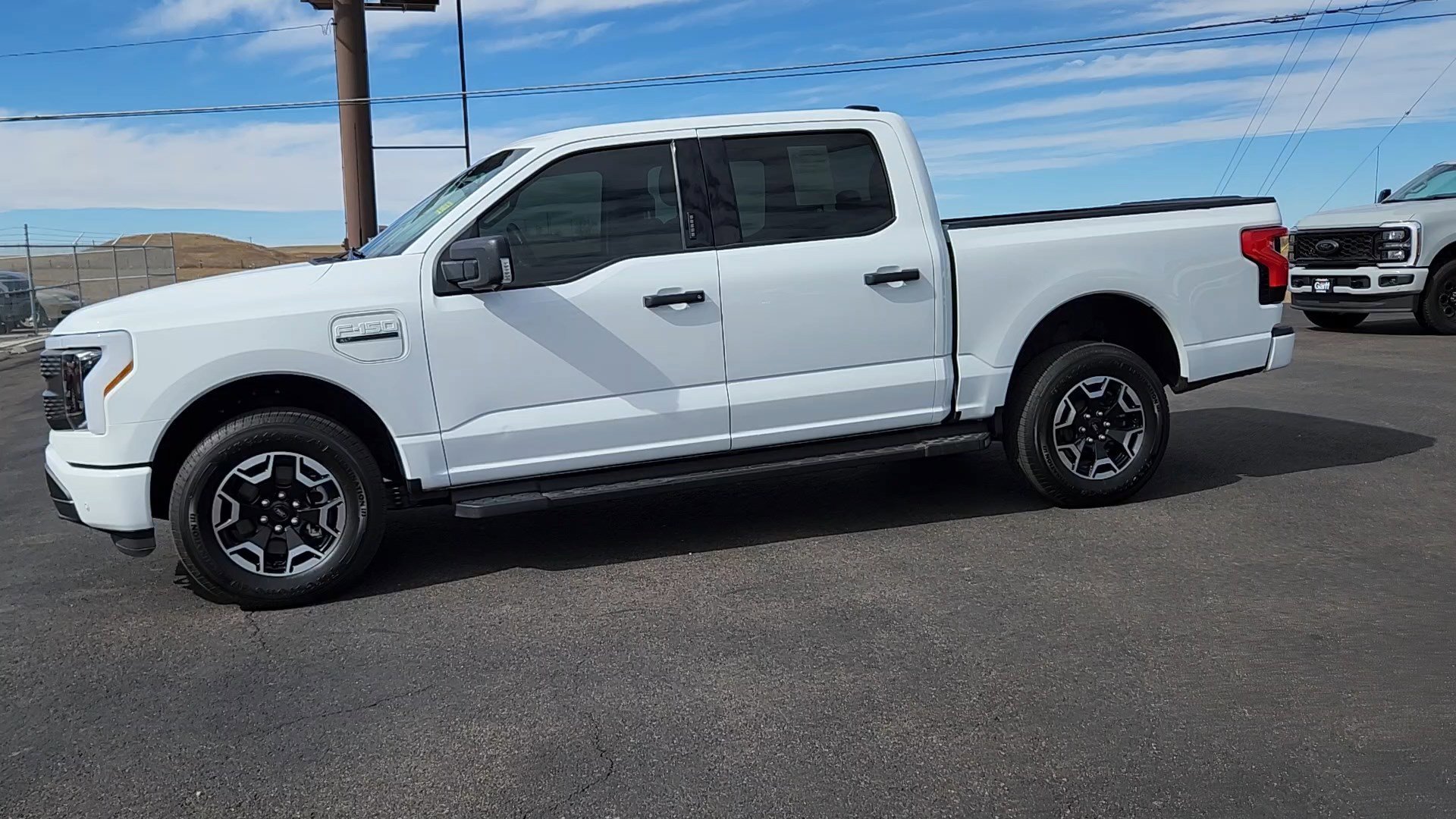 Used 2023 Ford F-150 Lightning XLT with VIN 1FTVW1EL5PWG36398 for sale in Orem, UT