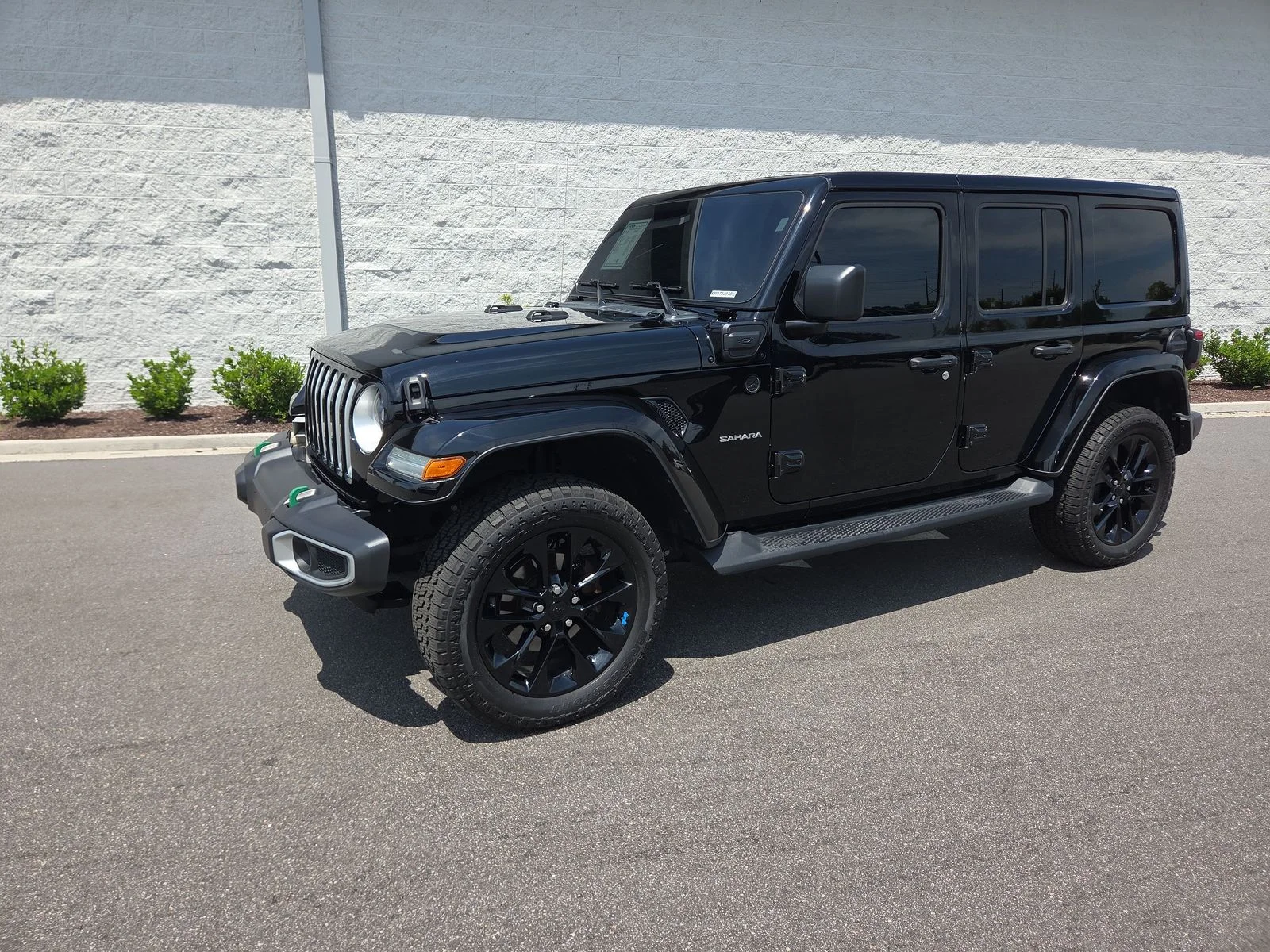 Used 2023 Black Clearcoat Jeep Sahara 4xe image 1