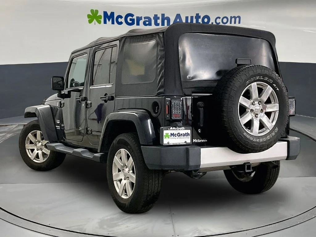 Used 2013 Black Jeep Unlimited Sahara image 3