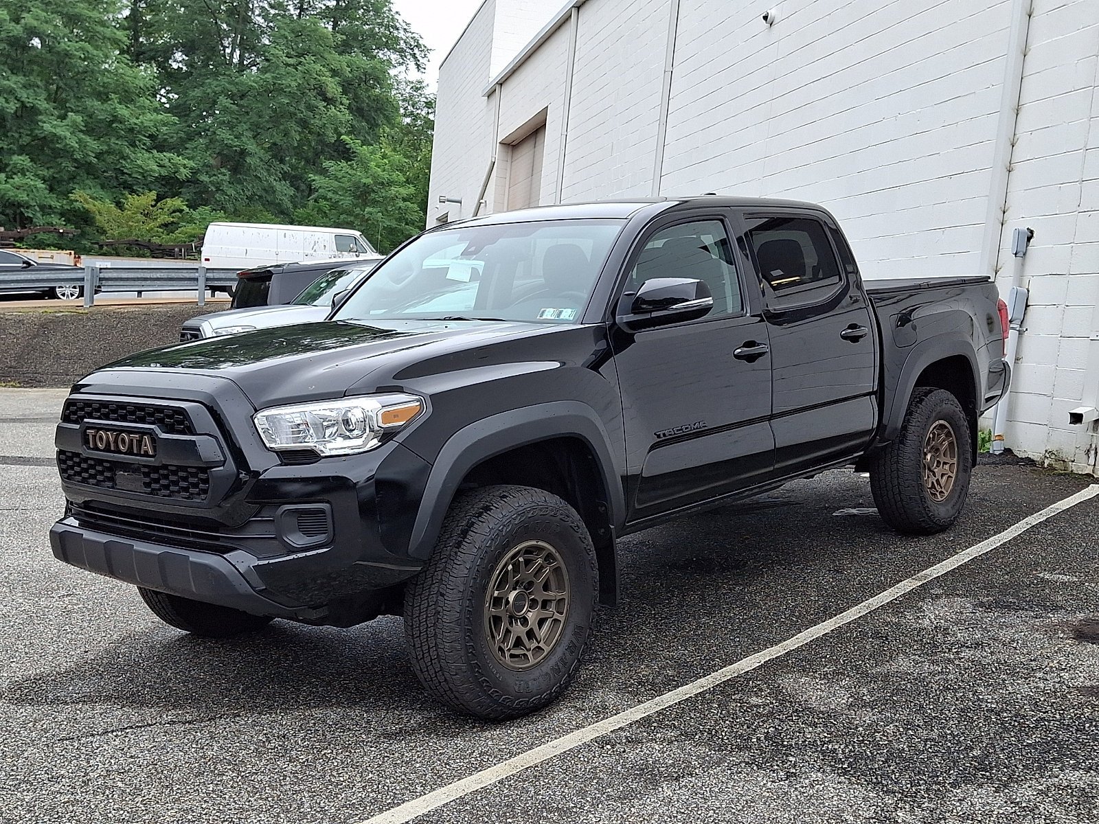 Used 2023 Black   202 Toyota Trail Edition image 2