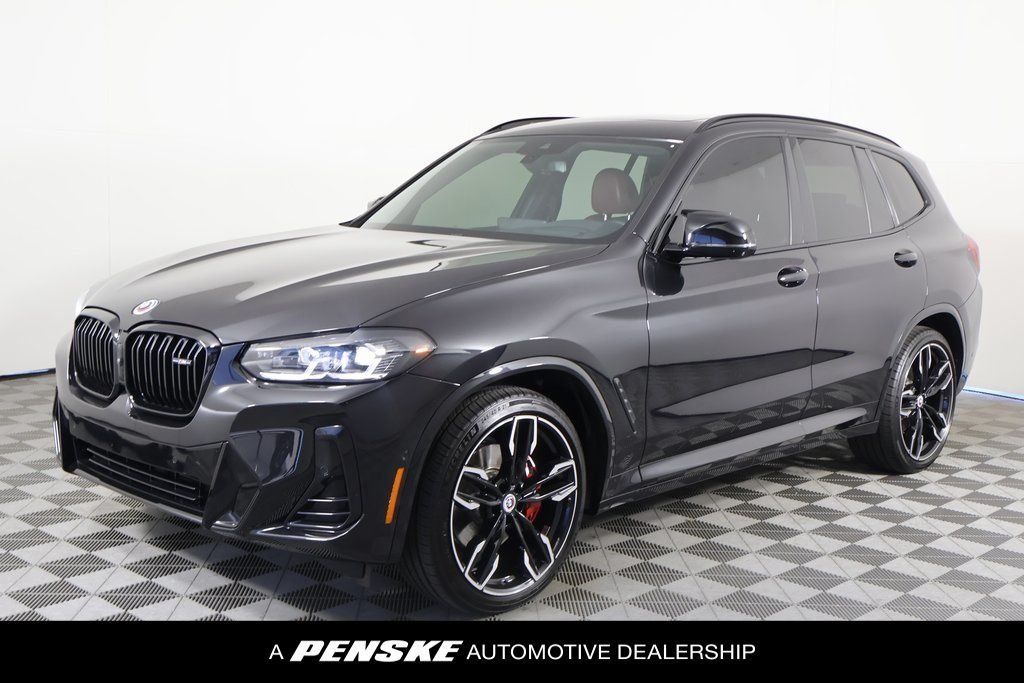 Used 2023 Black Sapphire Metallic BMW M40i image 1