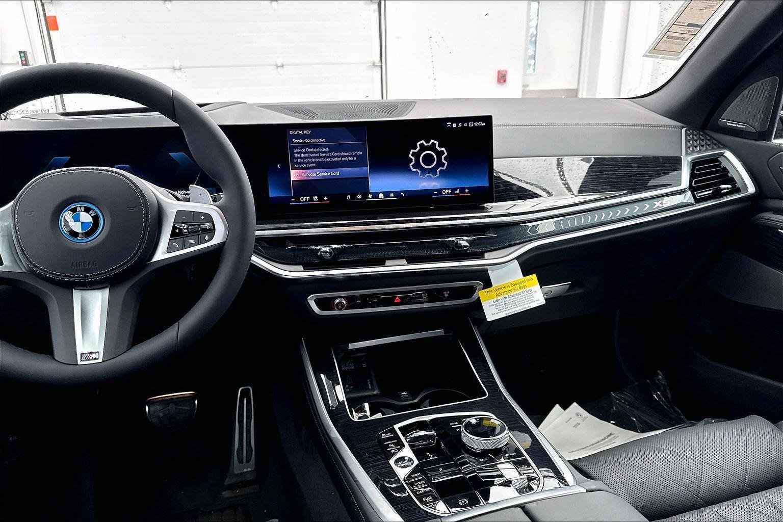 New 2026 Black Sapphire Metallic BMW xDrive50e image 13