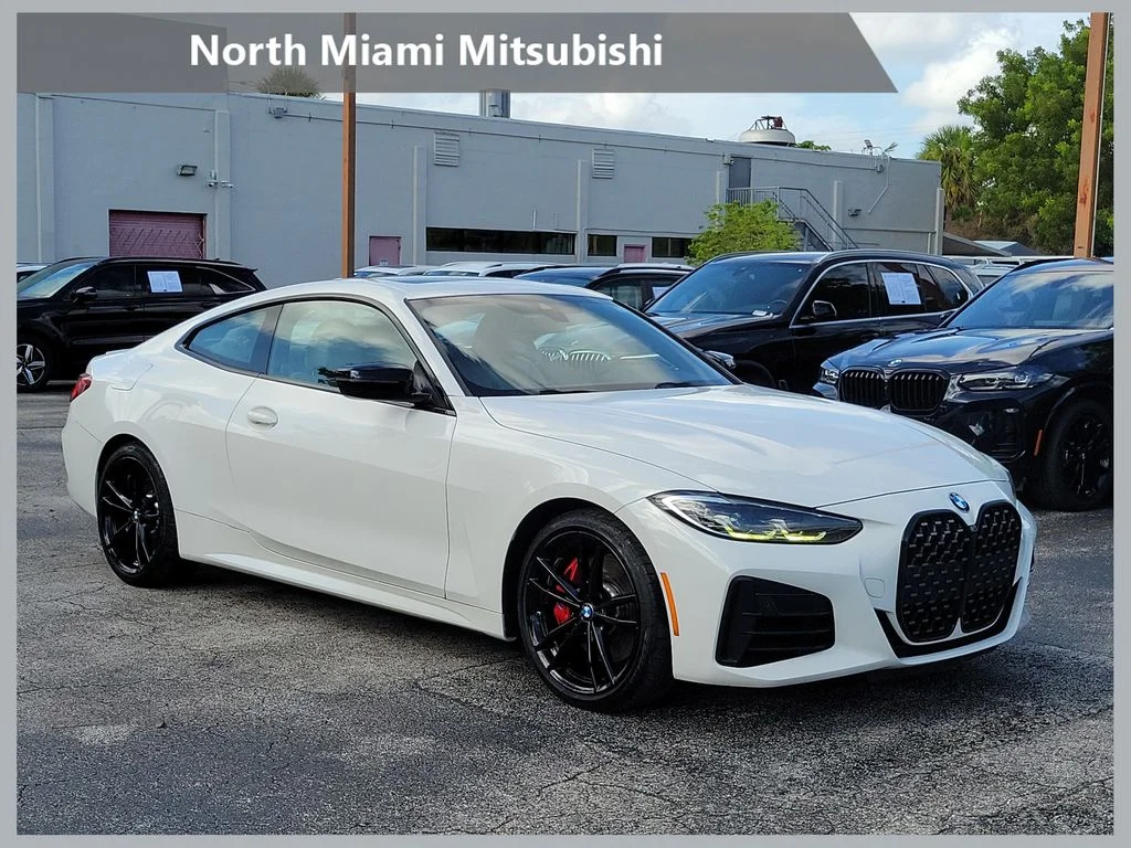 Used 2021 White BMW M440i xDrive image 1