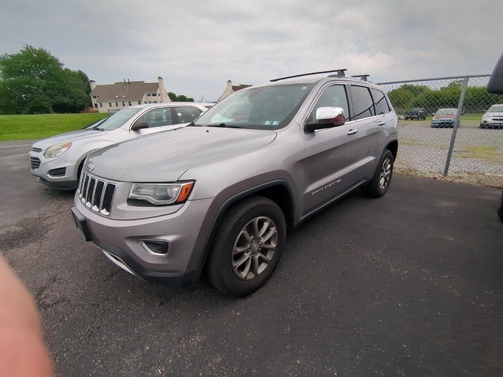 Used 2014 Billet Silver Metallic Clearcoat Jeep Limited image 4