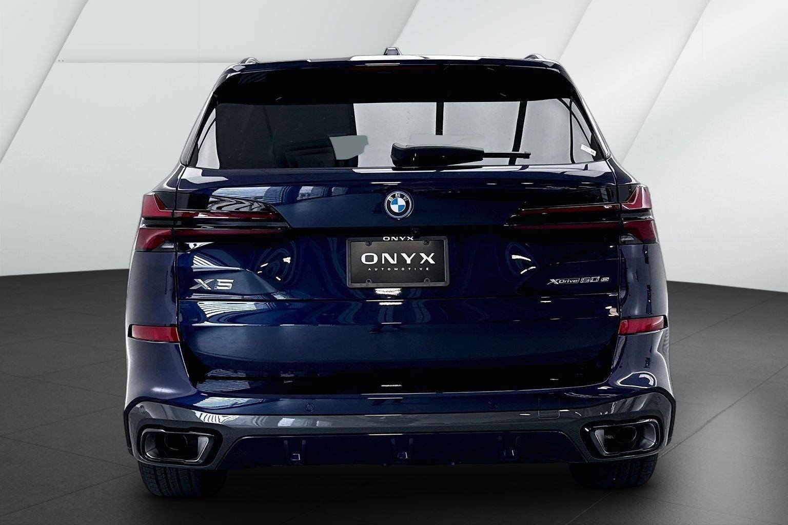 New 2026 Tanzanite Blue II Metallic BMW xDrive50e image 7