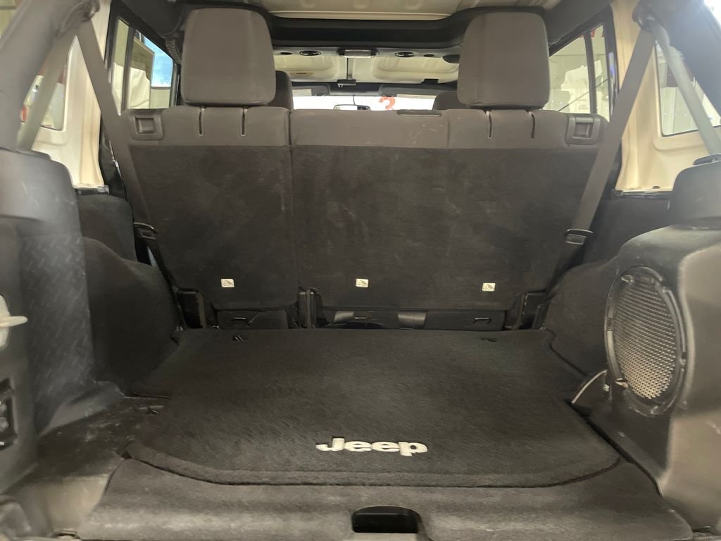 Used 2013 Black Jeep Unlimited Sport image 22