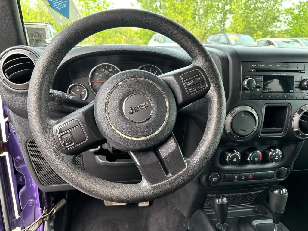 Used 2017 Purple Jeep Unlimited Sport image 11