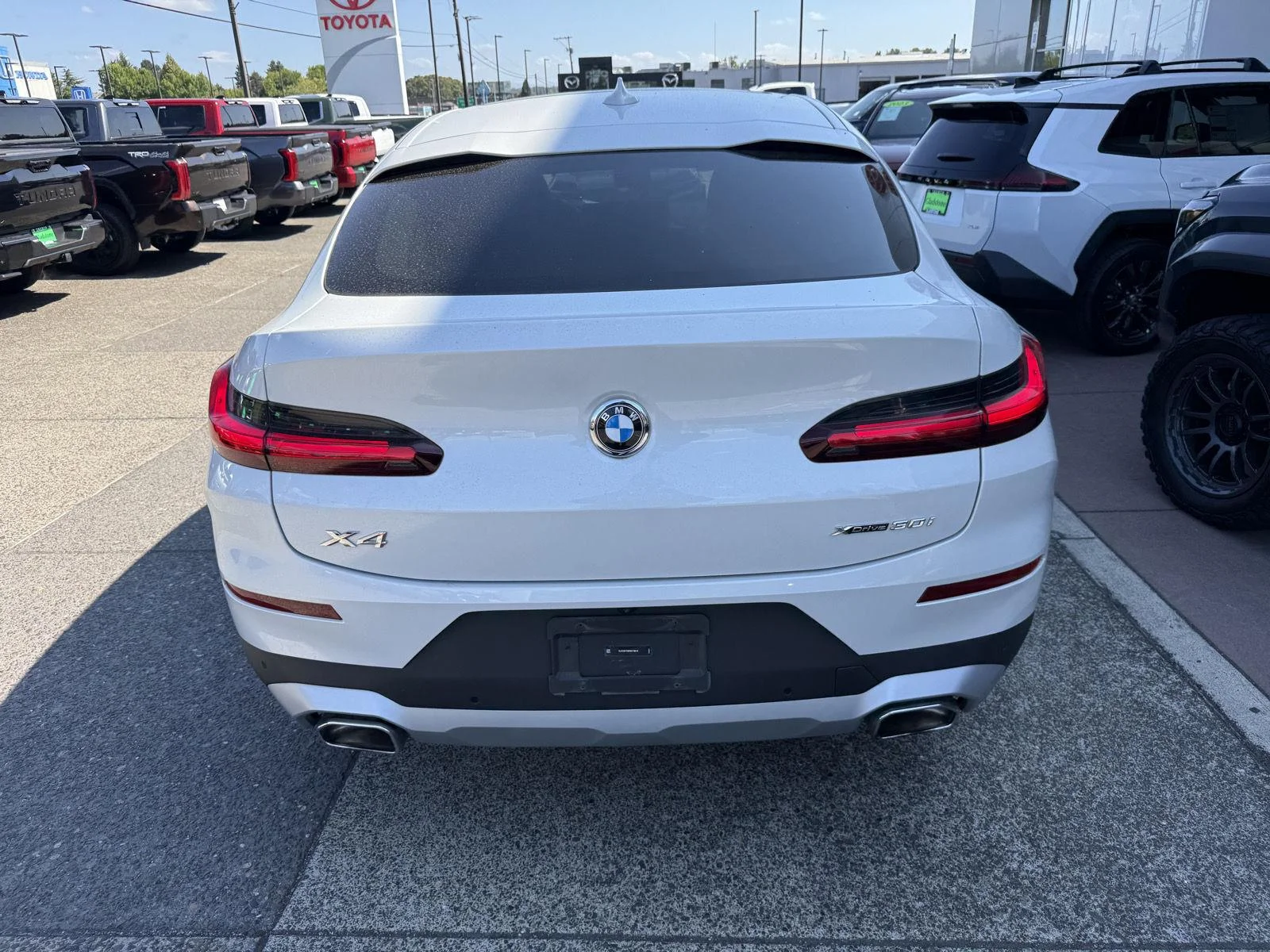 Used 2024 Mineral White Metallic BMW xDrive30i image 4