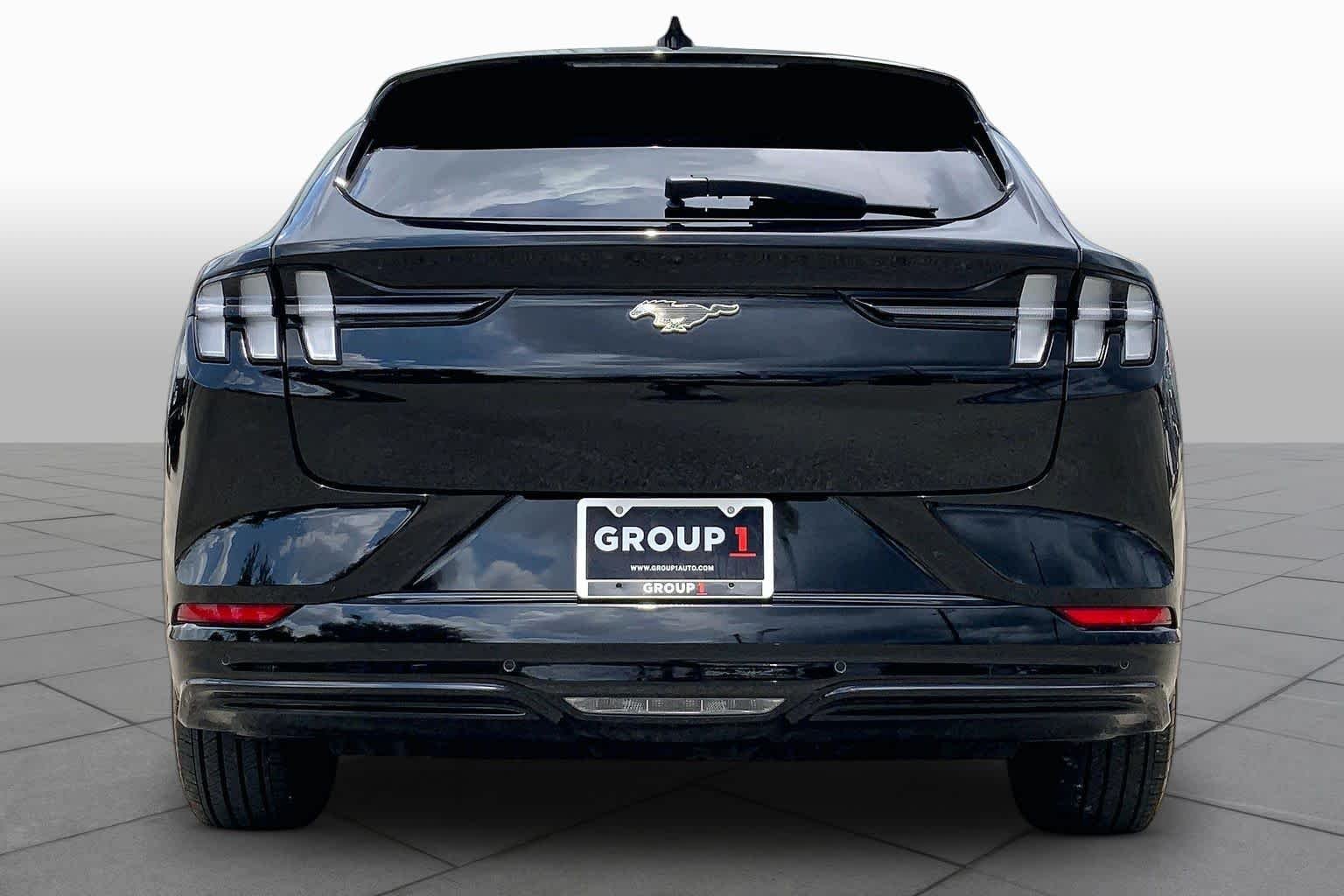 Used 2024 Shadow Black Ford Premium image 4