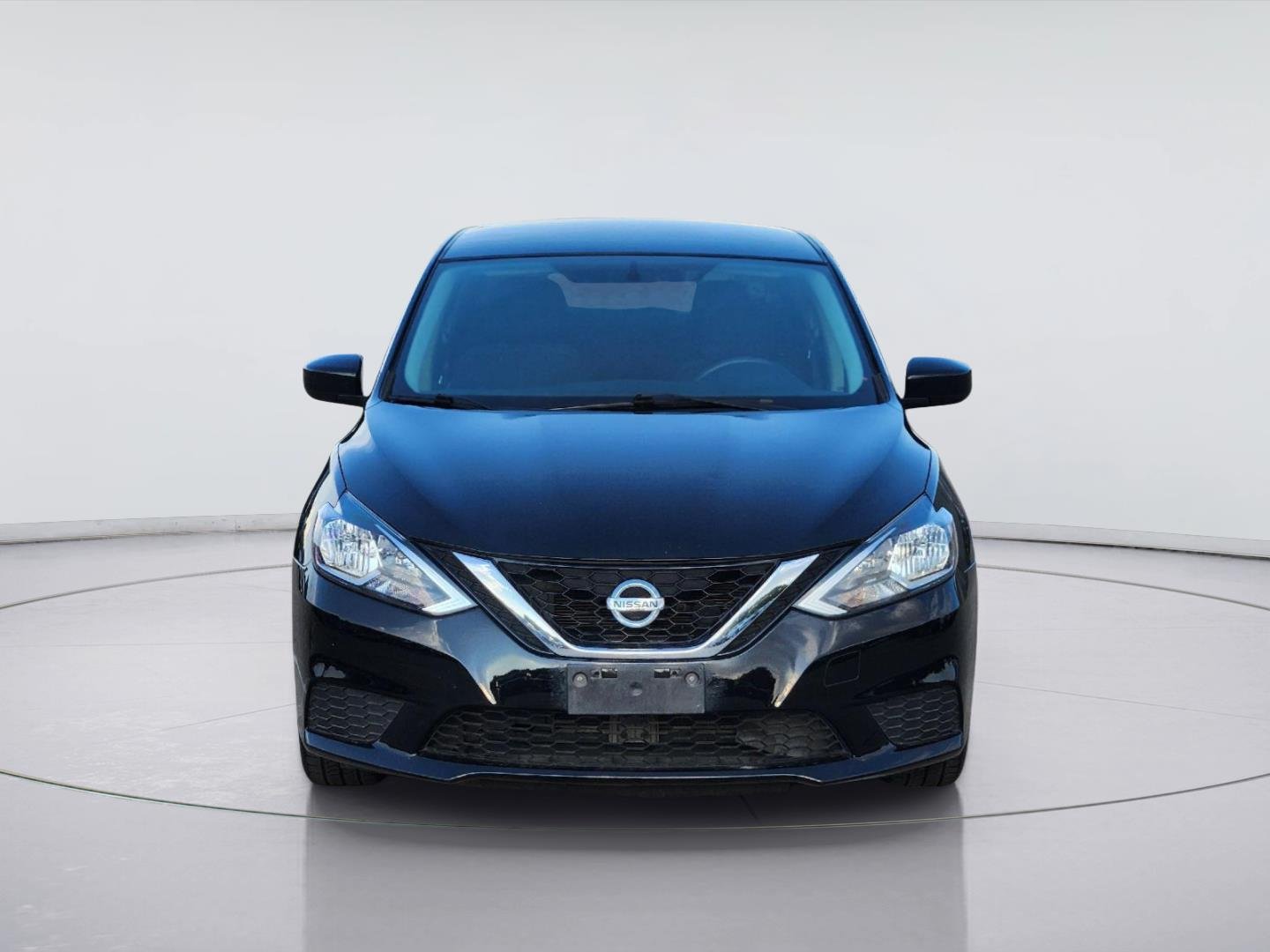 Used 2016 Super Black Nissan SV image 2