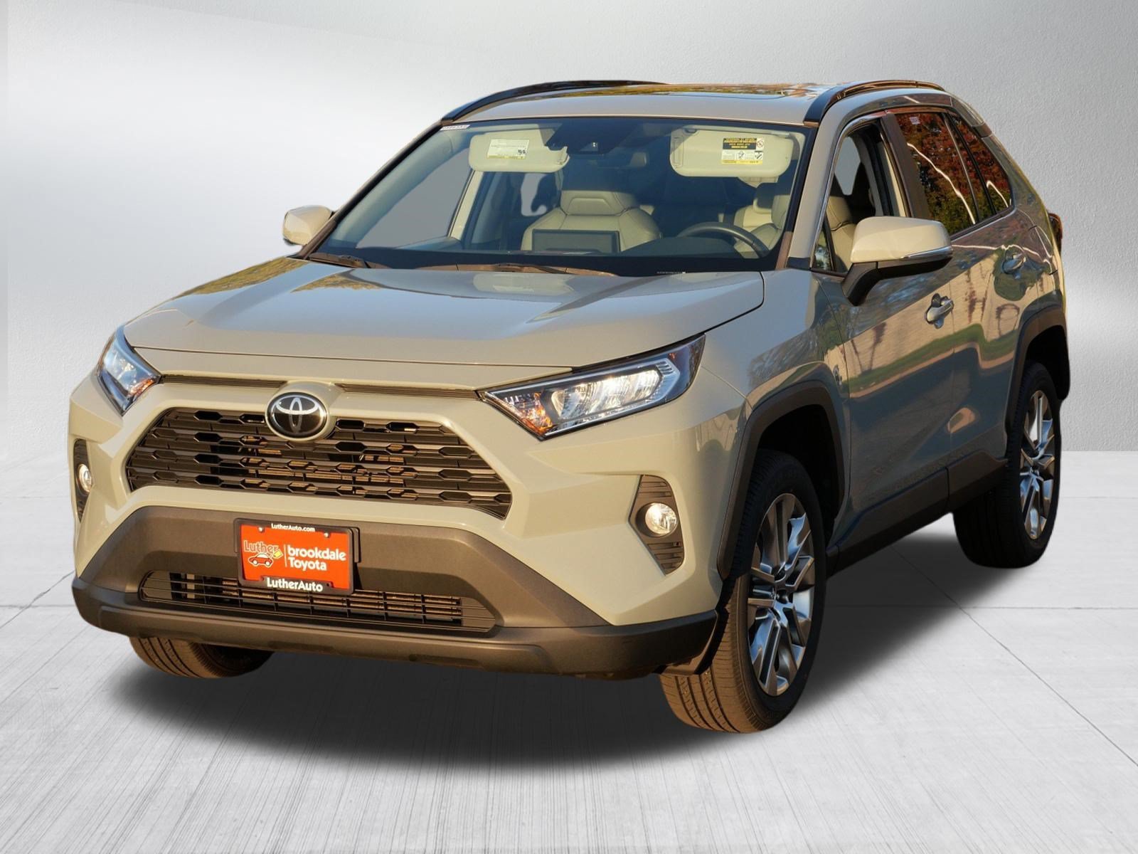 Certified 2021 Toyota RAV4 XLE Premium with VIN 2T3A1RFV0MW167677 for sale in Brooklyn Center, Minnesota