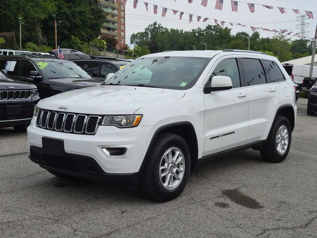 Used 2020 White Jeep Laredo E image 1
