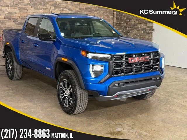 Used 2023 Blue Metallic GMC AT4 image 1