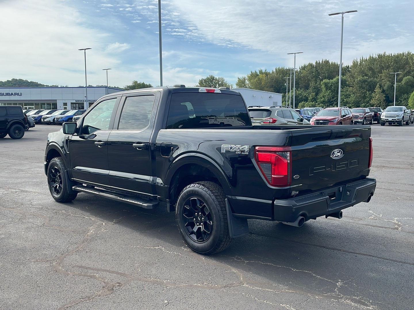 Used 2024 Agate Black Metallic Ford STX image 3