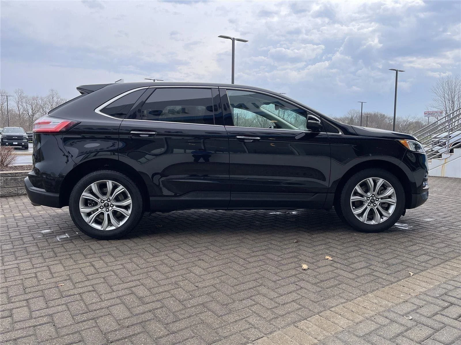 Used 2024 Agate Black Metallic Ford Titanium image 6