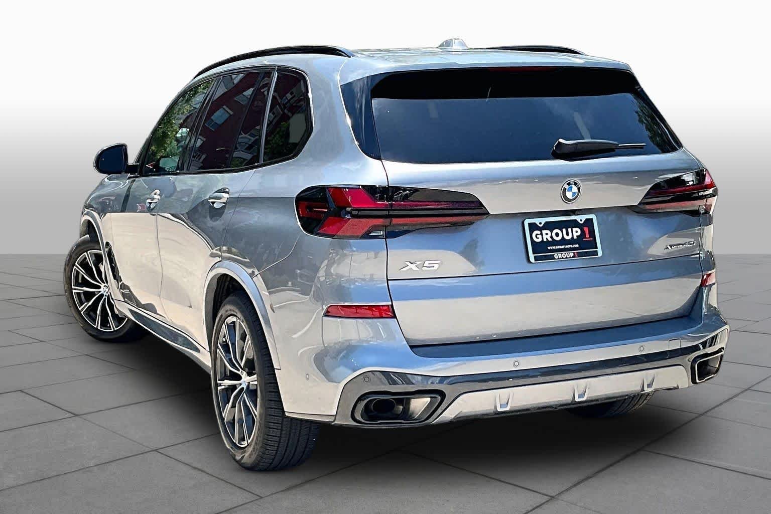 Used 2024 Skyscraper Grey Metallic BMW xDrive40i image 11