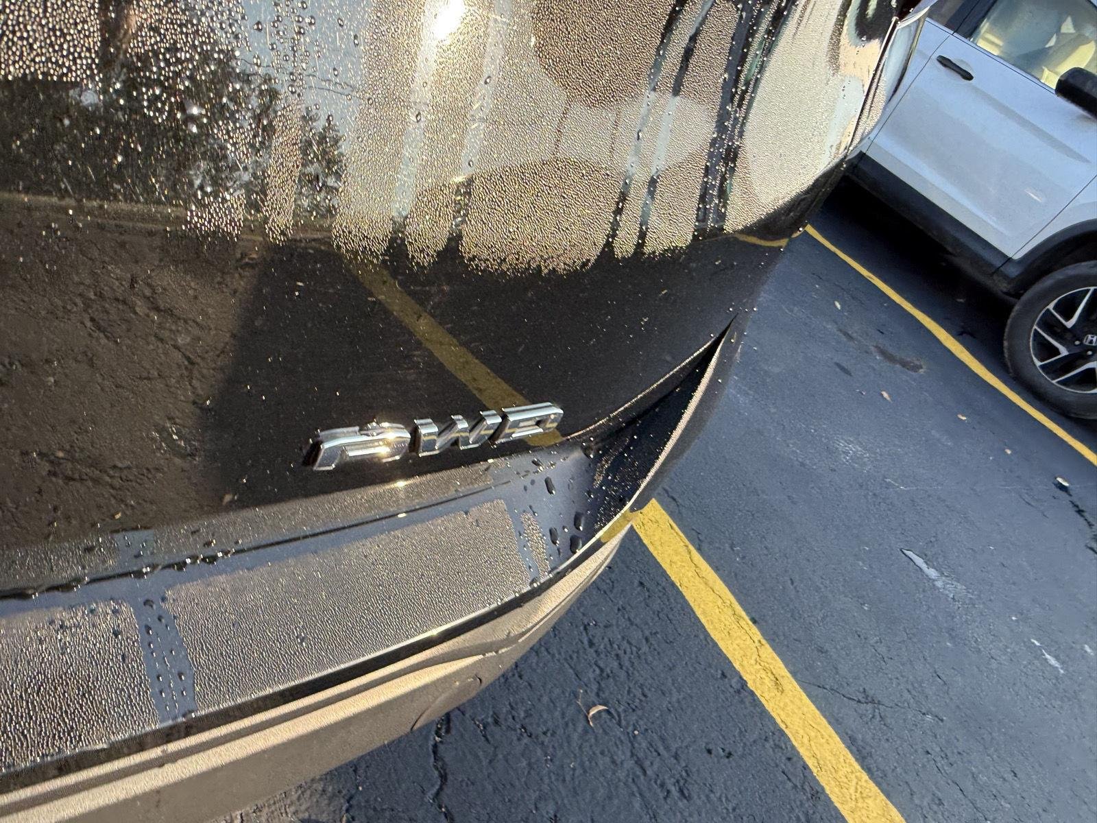 Used 2023 Ebony Twilight Metallic GMC SLE image 6