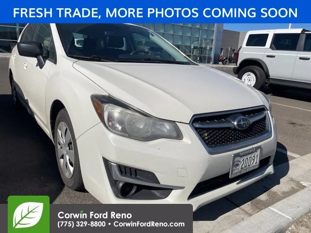 Used 2016 Crystal White Pearl Subaru 2.0i image 1