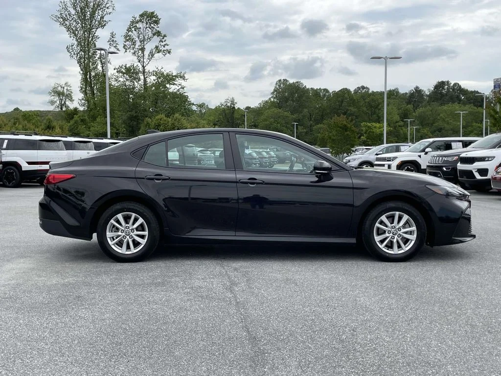 Used 2025 Midnight Black Metallic Toyota LE image 28