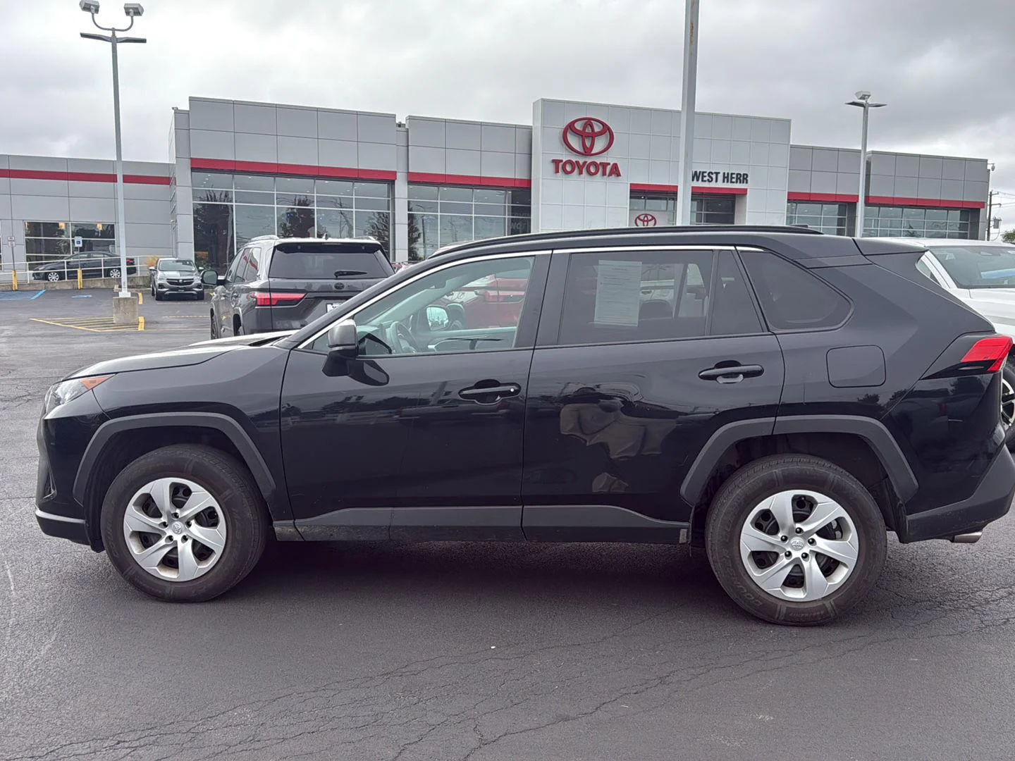 Used 2020 Midnight Black Metallic Toyota LE image 6