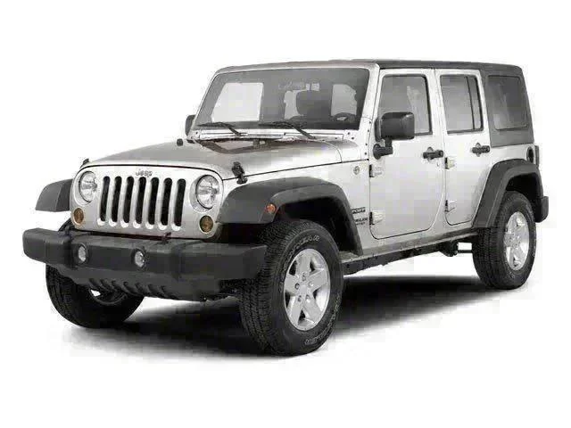 Used 2010 Silver Jeep Unlimited Sahara image 1