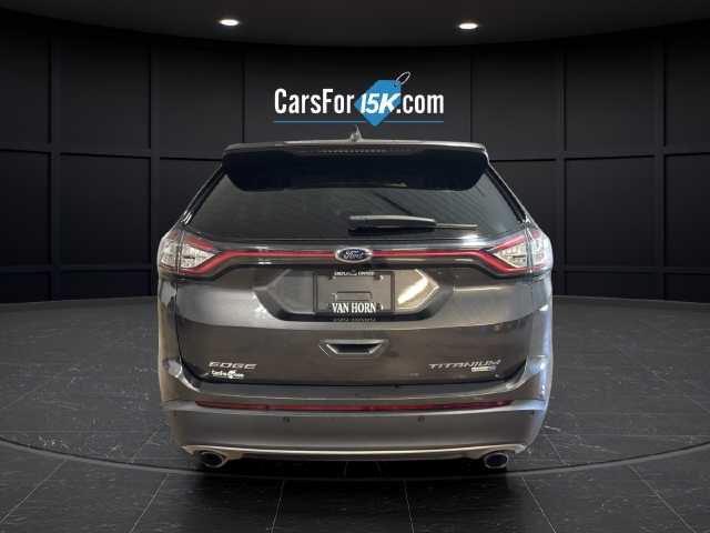 Used 2015 Magnetic Metallic Ford Titanium image 6