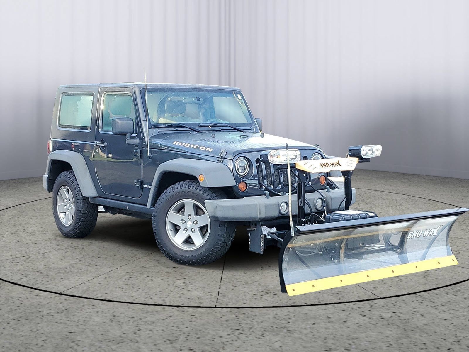 Used 2010 Gray Jeep Rubicon image 1