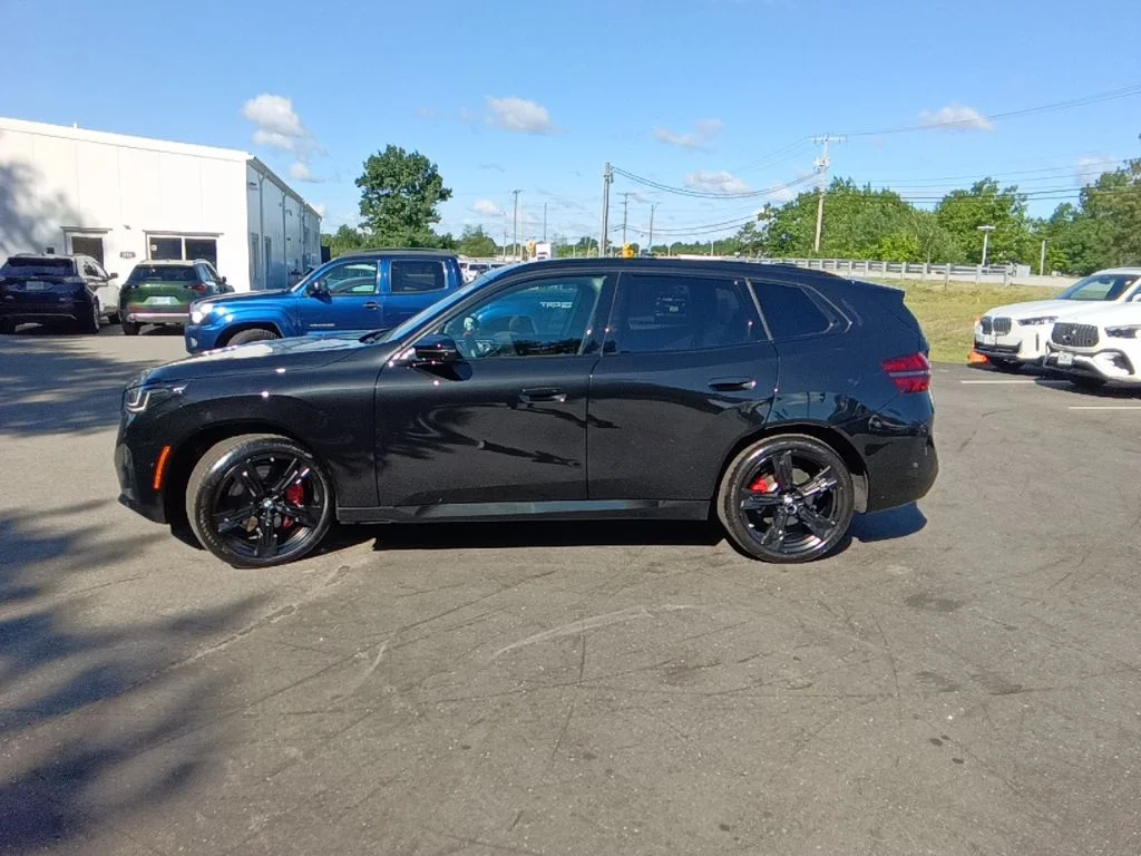 Used 2026 Black Sapphire Metallic BMW M50 xDrive image 4