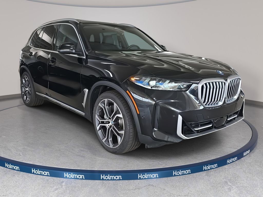 New 2026 Black Sapphire Metallic BMW xDrive50e image 3