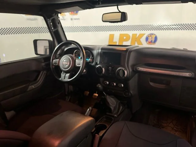 Used 2014 Billet Metallic Clearcoat Jeep Unlimited Sport image 28
