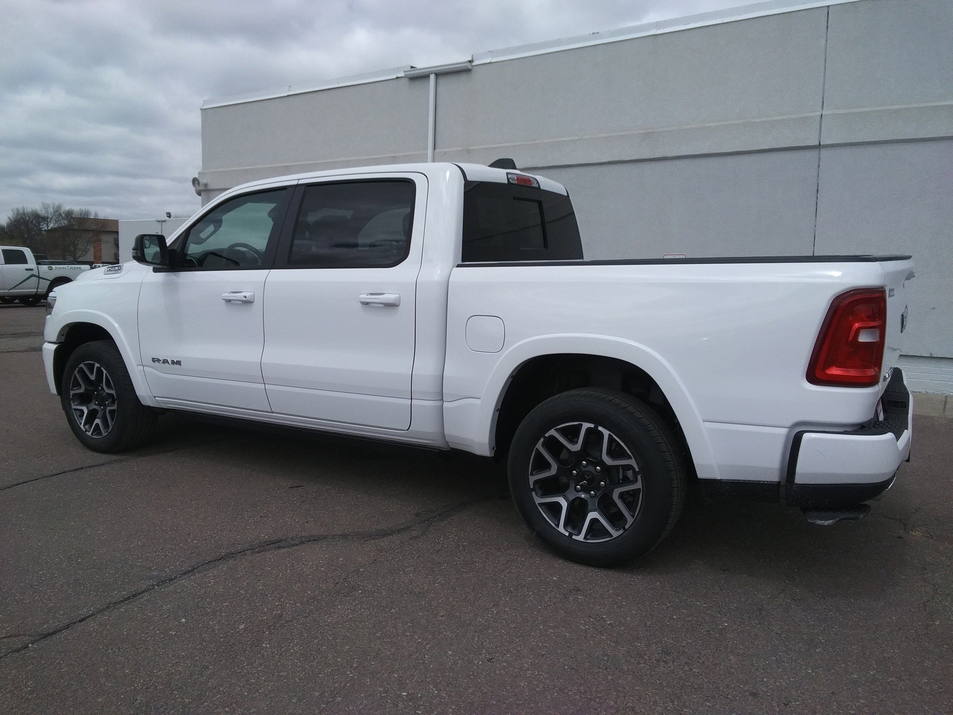 New 2026 Bright White Clear-Coat Exterior Paint RAM Laramie image 7
