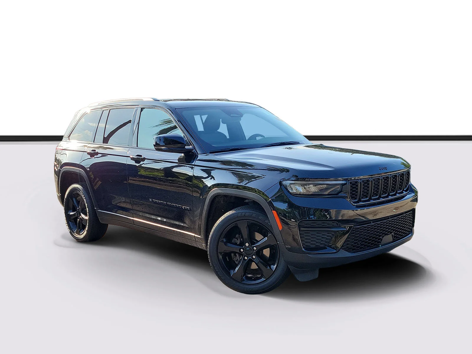Used 2024 Diamond Black Crystal Pearlcoat Jeep Altitude image 1